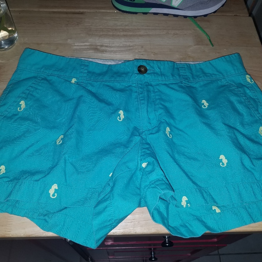 Turquoise shorts with green sea horses